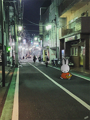 miffy character on an illuminated street at night
